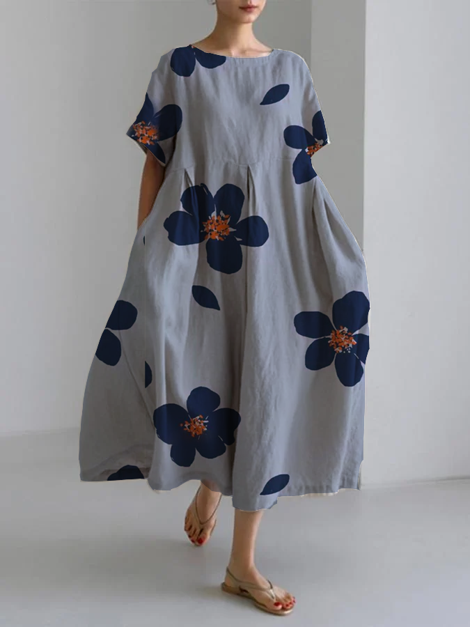 RAFFAELLA | Lang Kleid mit Blumenmuster, lockerer Passform und elegantem Details für schicke Tage