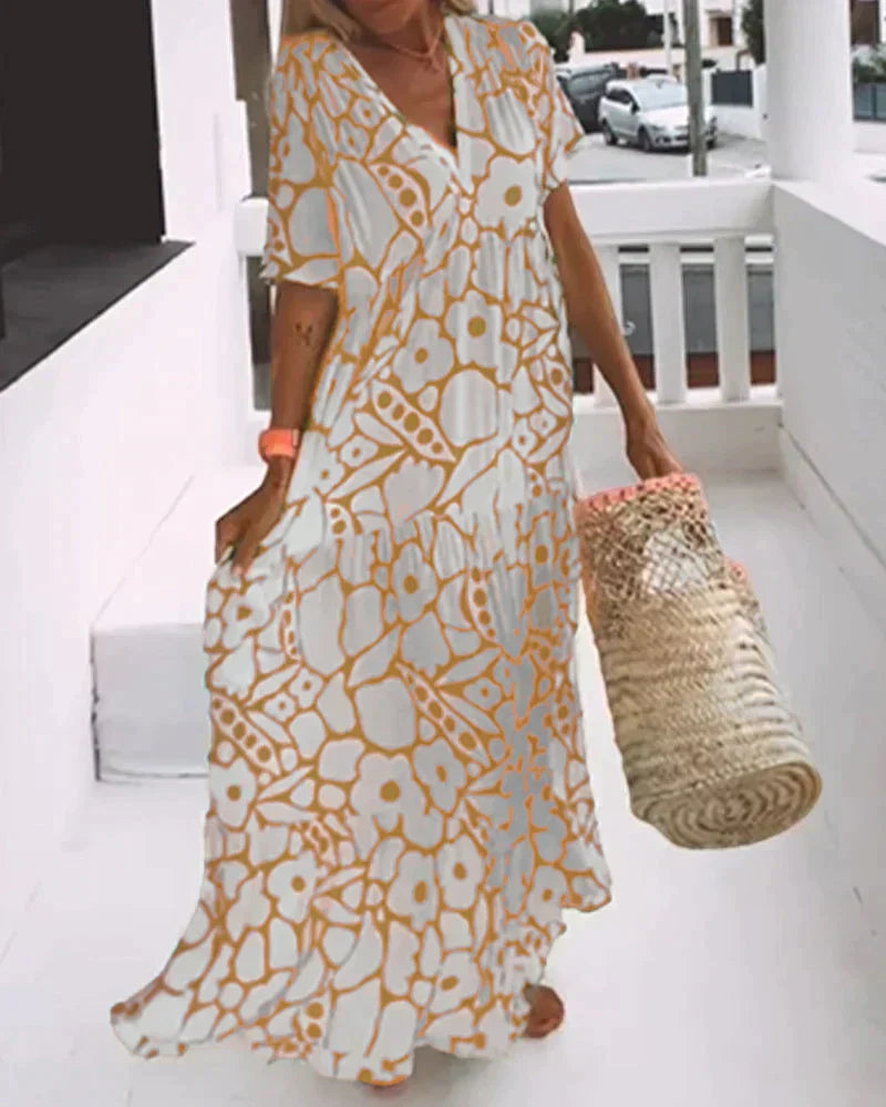 CHRISTINE | Langes Sommerkleid mit fließendem Schnitt und eleganten grafischen Mustern