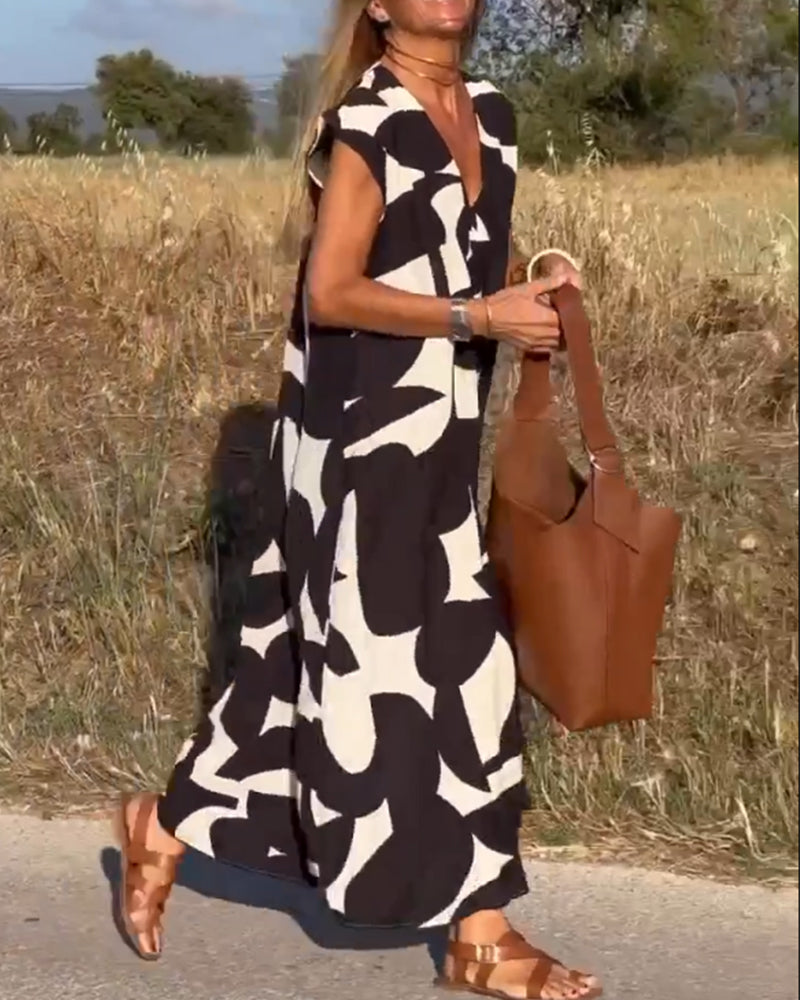 NAOMI | Gestreiftes Maxikleid mit V-Ausschnitt und A-Linien-Schnitt für einen Urlaubslook