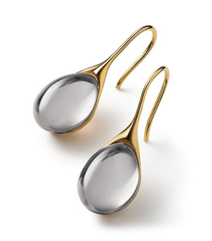 Goldene und silberne Edelstein-Ohrringe