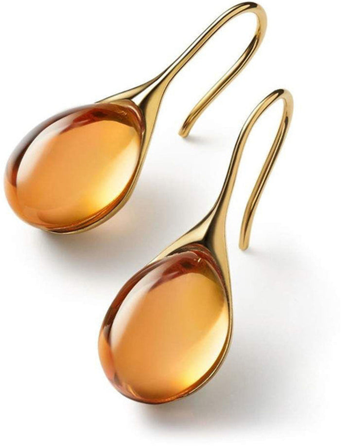 Goldene und silberne Edelstein-Ohrringe