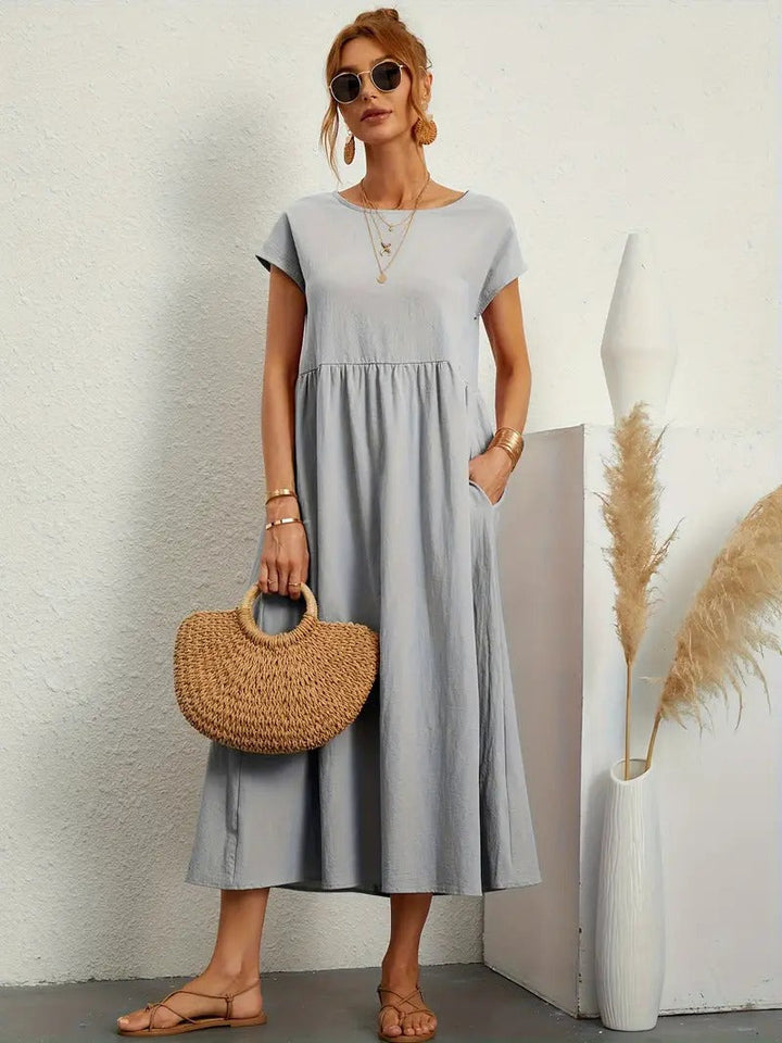 Leonor-Kleid mit Tasche