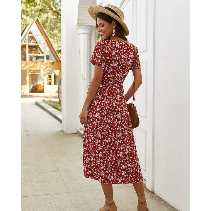 Lola Geblümte Ibiza Midi-Kleid